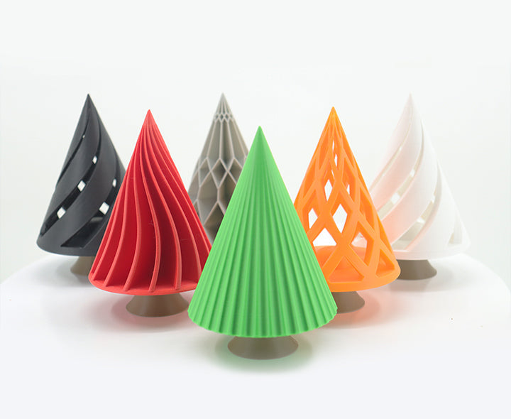 Colorful cone - shaped 3D - printed objects, showcasing creative parts made with advanced filaments like ABS/ASA, highlighting the material versatility for 3D printing projects.