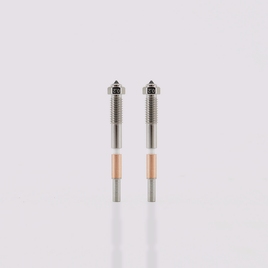 Two Q2 bimetal nozzles 0.2mm tips with hardened steel core and copper-plated exterior