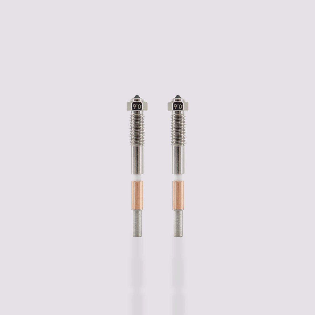 Two Q2 bimetal nozzles with 0.6 mm marking